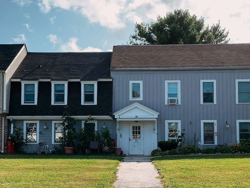 Exterior of an end-unit townhome (sample photo, not the actual property)